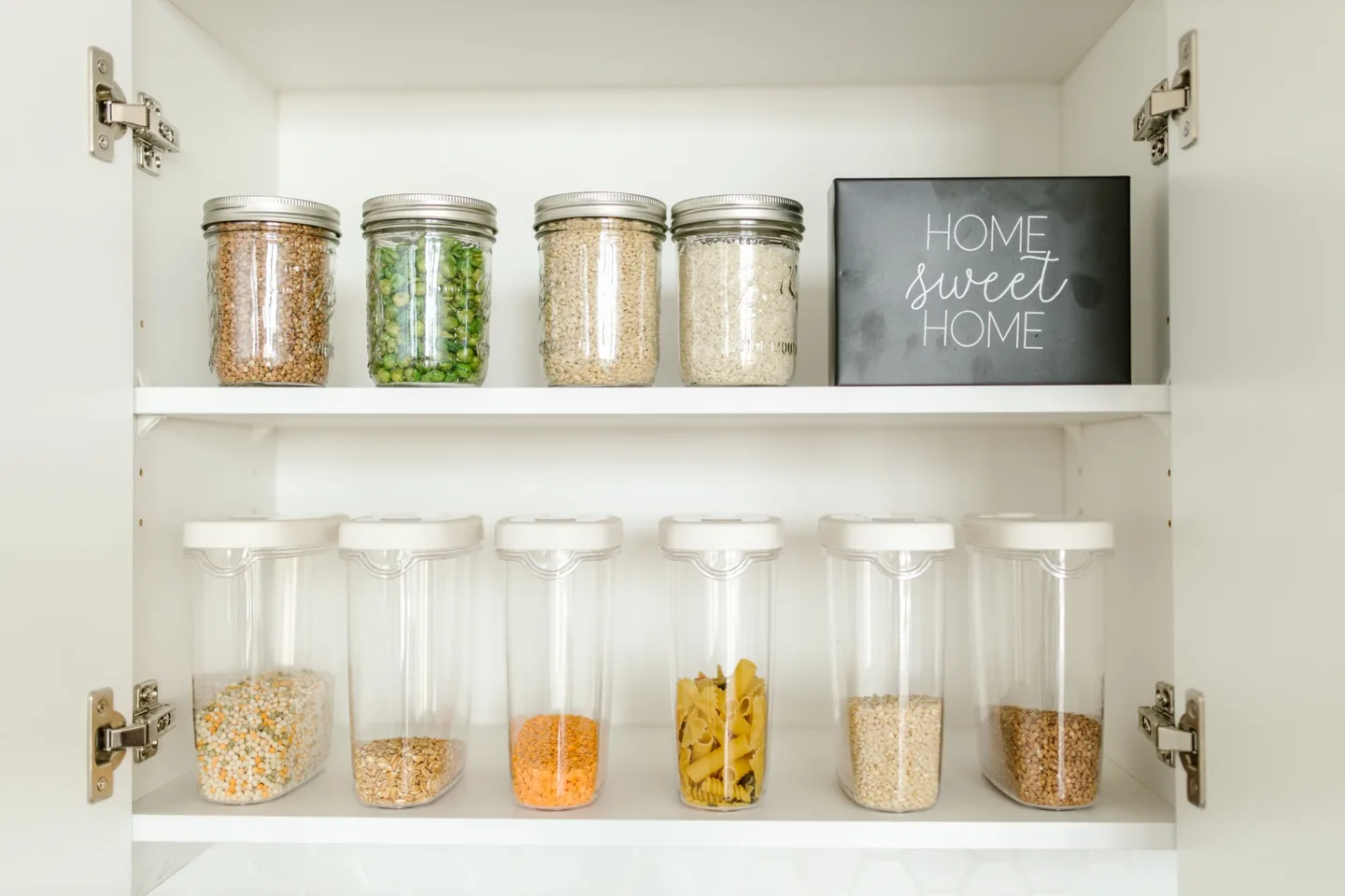 organized pantry shelves with clear food storage containers